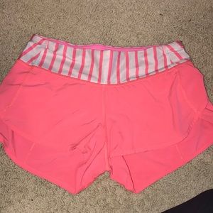 Pink Lululemon speed up shorts 2.5” size 2